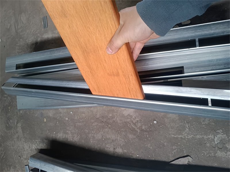 Skilled workers constructing a horse stable using premium materials.
