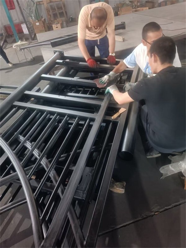 Production area for horse stable construction, showcasing modular designs and equipment.